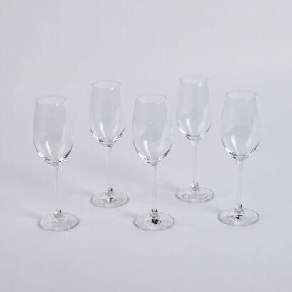 A Collection Of Five Etched Riedel Vinum Champagne Flutes