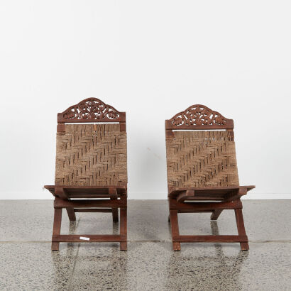 A Pair of Vintage Collapsable Wooden Balinese Chairs