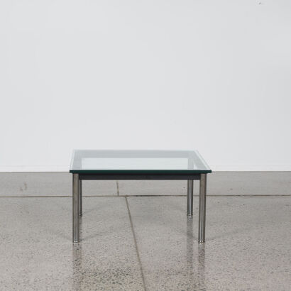 A Smoked Glass And Chrome Side Table
