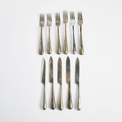 A Set Of Eleven Walker And Hall Silver Plate Knives And Forks