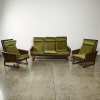 A Mid-Century Vinyl And Teak Three Piece Lounge Setting