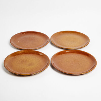 A Set Of Four Crown Lynn Plates