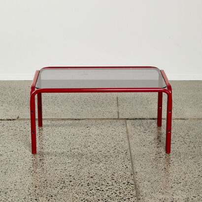 A Tubular Steel And Smoked Glass Coffee Table