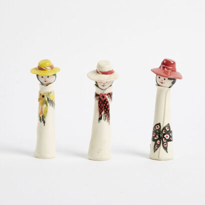 A trio of ceramic figures