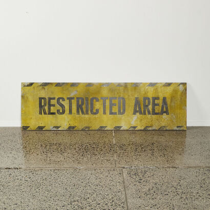 A Hand-Painted Restricted Area Sign