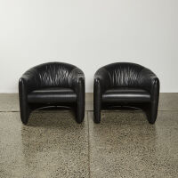 A Pair Of Jules Huemann Black Leather Tub Chairs For Metropolitan USA