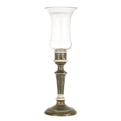 A Tall Green Candle Stand with Glass Shade