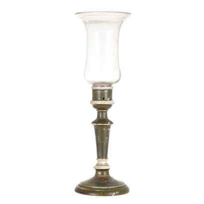 A Tall Green Candle Stand with Glass Shade