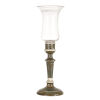 A Tall Green Candle Stand with Glass Shade