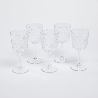 A Set Of Five Cut Glass Wine Tumblers