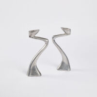 A Pair Of Nineties Design Aluminium Candlesticks