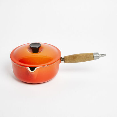 An Orange Levcoware Japan Cast Iron Casserole Dish