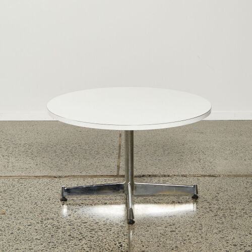 A Sixties Round Formica And Chrome Coffee Table