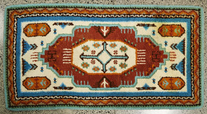 A Large Hand Tufted Retro Rug