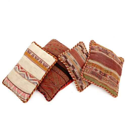 Four Antique Peruvian Textile Cushions