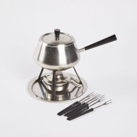 A Mid Century Fondue Set Made In Switzerland