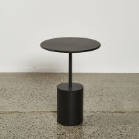 A Modern Designer End Table With Cylindrical Base in Black