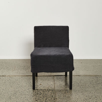 A Designer Occasional Chair With Charcoal Slip Cover