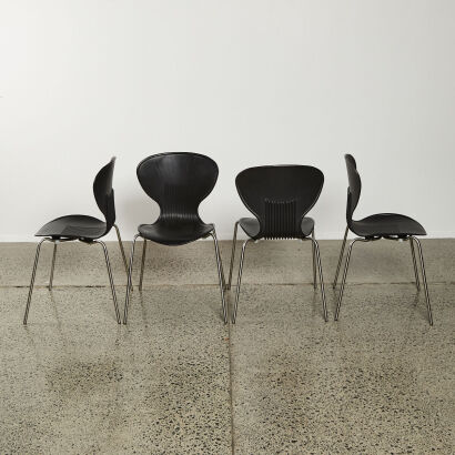 A Suite Of Four Cintesi Chairs With Brushed Stainless Legs