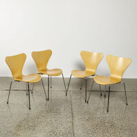 A Set Of Four Genuine Fritz Hansen Chairs