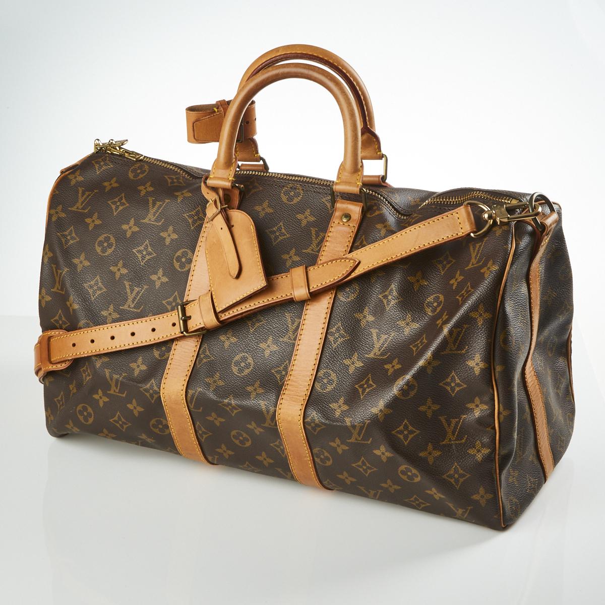 Sold at Auction: Louis Vuitton, Louis Vuitton Keepall Bandouliere Duffle Bag