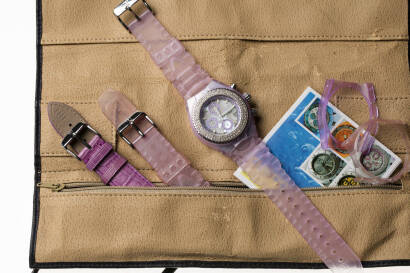 A Lady's stainless steel Techno Marine chronograph wristwatch, circa 2002. Quartz. 39mm. Case number 32686. Torneau-shaped case with circular mother of pearl dial and diamond set bezel. Pink plastic strap. To be sold with original pouch, papers, extra spo