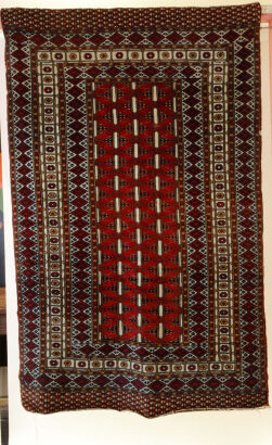A Hand-Knotted Afghan Silk Rug