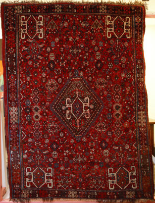 A Hand-Knotted Qashqai Rug