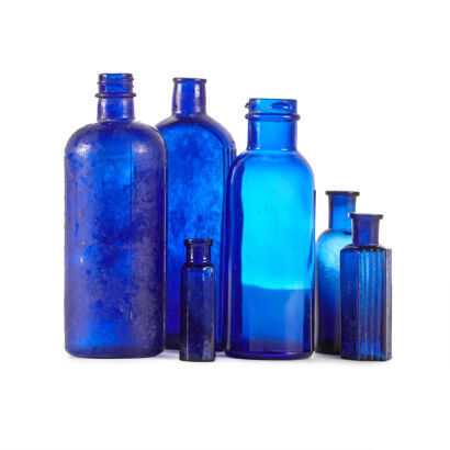 A Collection of Six Blue Bottles