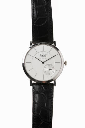 A Gentleman's gold Antiplano wristwatch, Piaget, automatic. 43mm. Circular case with display glass back. 27 jewel movement SN1083839. Satin silver dial with offset sub-seconds. 18ct white gold. Purchased at Harrods, London 2013. Original box and booklets.