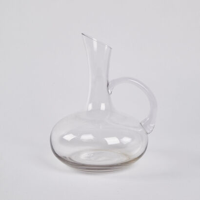 A Wine Decanter With Handle