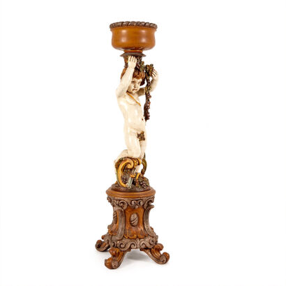A Carved and Painted Figural Jardini&egrave;re Stand