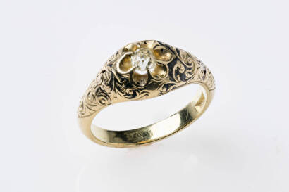 A Victorian enamel and diamond Memorium ring, the rose cut diamond of estimated weight 0.12 carat is in an enamel and gold engraved setting with enamel partially intact. 18ct yellow gold. Weight 5.28 grams. Inscription dated 1864. Size M.&nbsp;