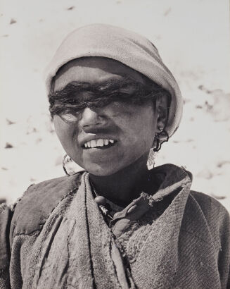 ALFRED GREGORY Sherpa boy (porter) eyes covered with hair as makeshift snow goggles