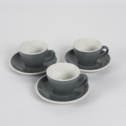 A Trio Of Grey Acme Cups And Saucers