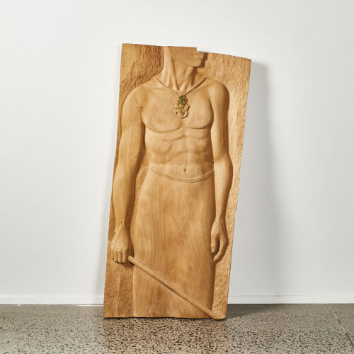 A Large Carving of a Māori Man by Andrew Wood