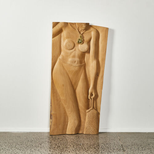 A Large Carving of a Māori Woman by Andrew Wood