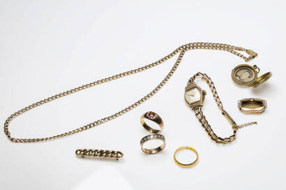 Seven assorted jewellery items, including: 9ct gold garnet signet ring, a gold bracelet watch and watch case, a curb link necklace and bar brooch. Total weight of 9ct including watch movement 28.5 grams. To be sold with an antique double sided rolled gold