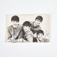 A Signed Photo of the Beatles Autopen