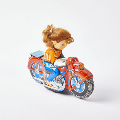 A Vintage Tin Plate Motorcycle Toy