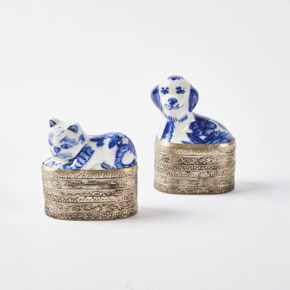 A Pair Of Bombay Co Blue And White Figurines