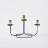 A Mid-Century Black Enamel And Brass Candle Holder