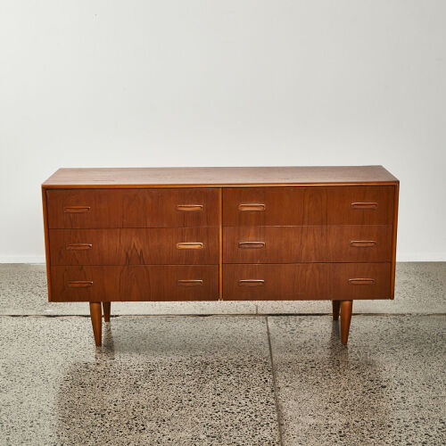 A Mid Century Chest Of Drawers