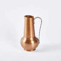 A Vintage Handbeaten Copper Jug