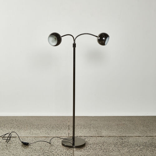 A Floor Standing Mcm Twin Eyeball Lamp With Adjustable Heads