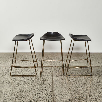 A Trio Of Black And Gold Framed Barstools