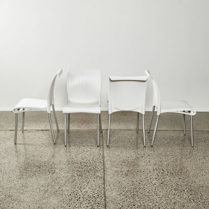 A Suite Of Four Nardi Regina Chairs In White