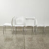 A Suite Of Four Nardi Regina Chairs In White