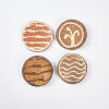 A Set Of Four Earthenware Coasters By Richard Parker