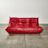 A Three Seater Togo By Ligne Roset In Indiana Rouge Leather